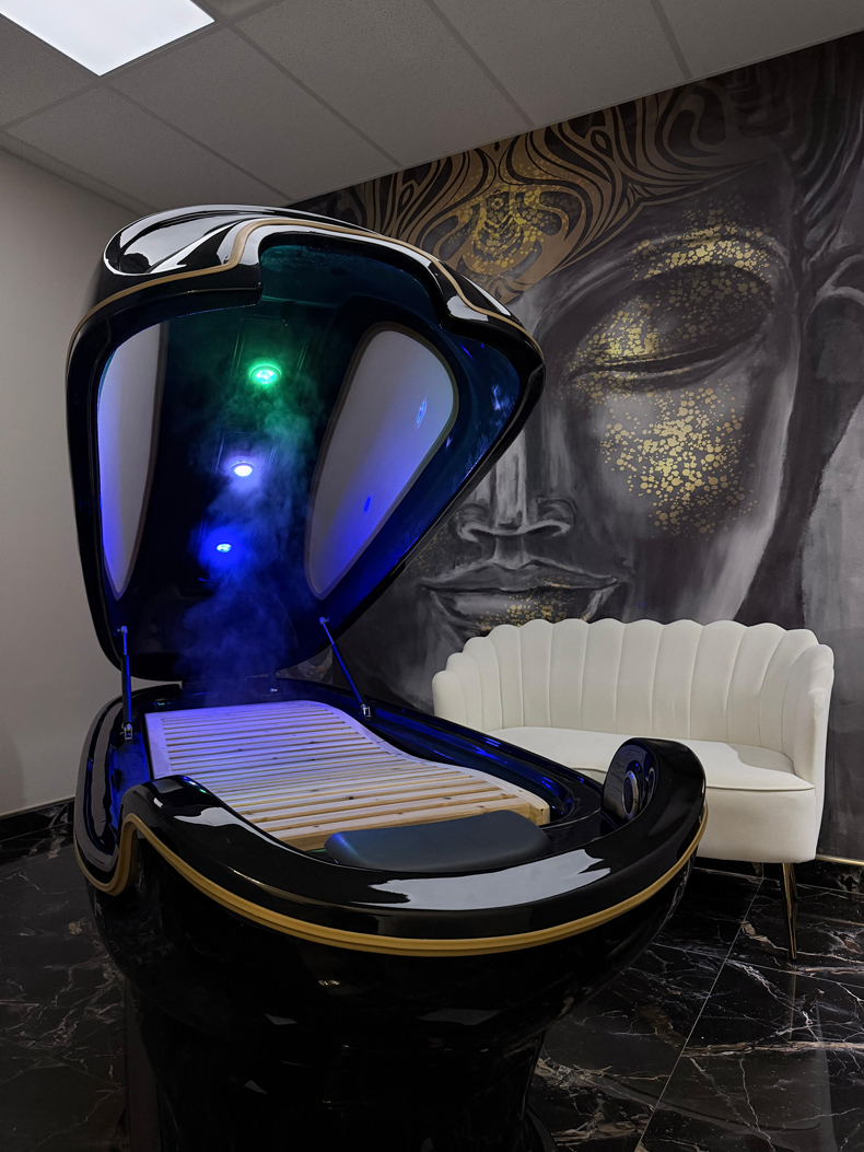 Infrared therapy pod open with lights