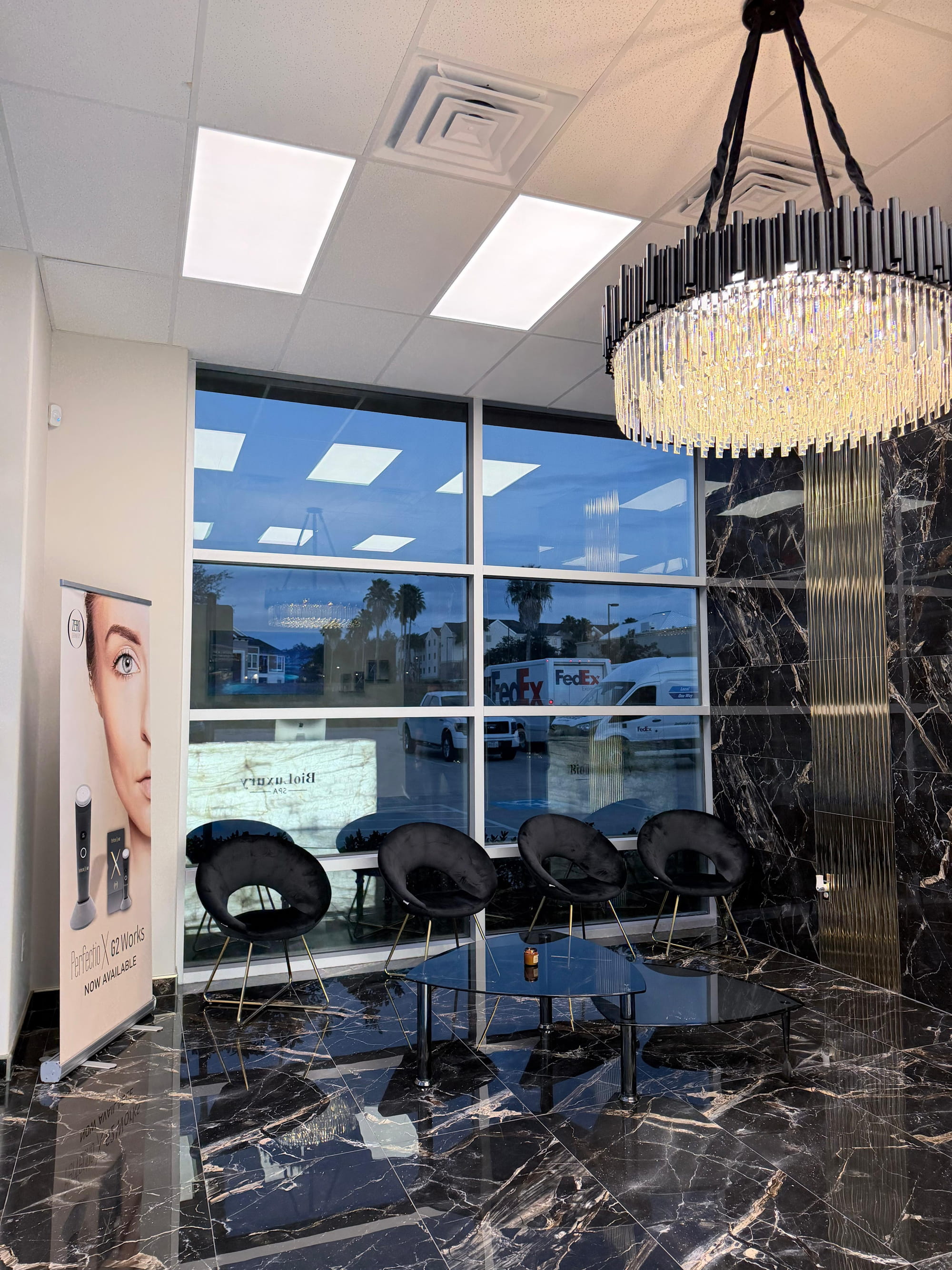 Lobby waiting area with crystal chandelier