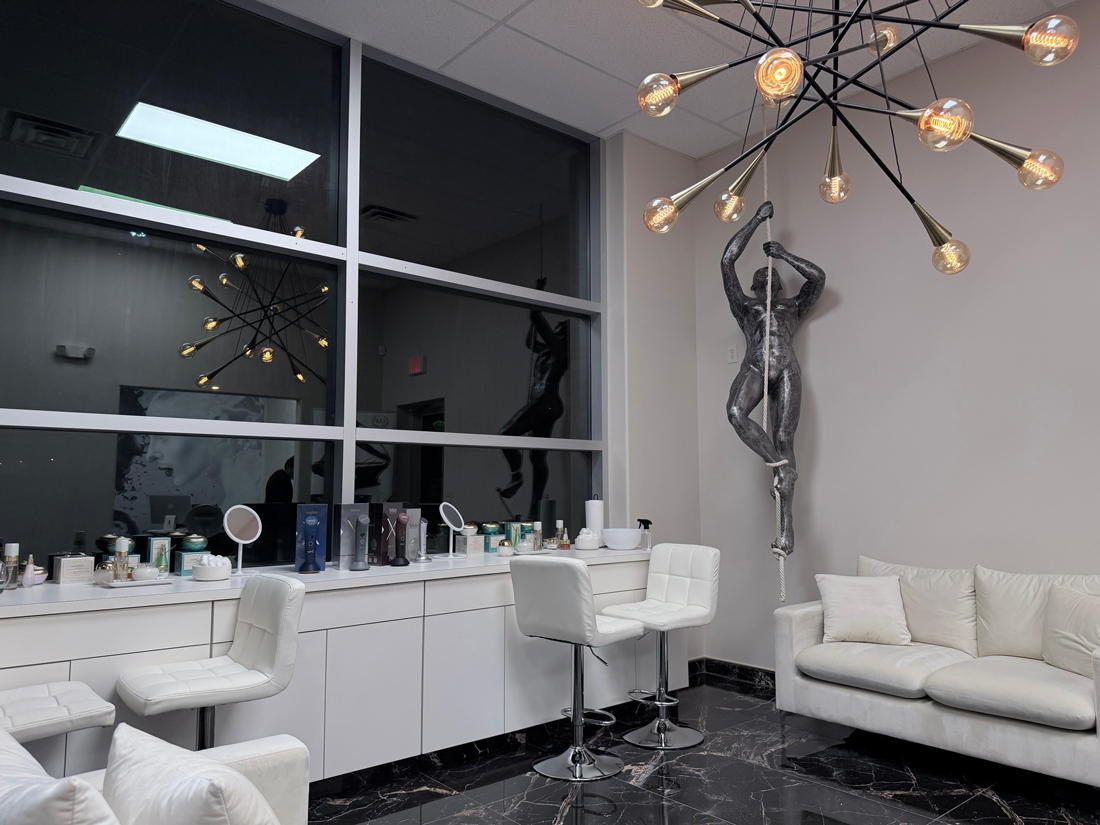 Skincare lounge with products and seating
