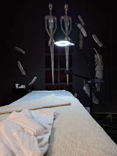 Treatment room with artistic wall decor